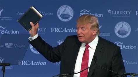 donald trump holding bible image